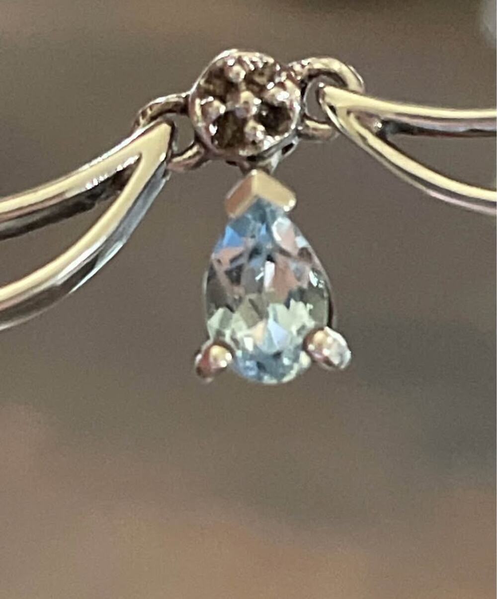 Beautiful 925 not sure of stones.Light Blue birthstone?